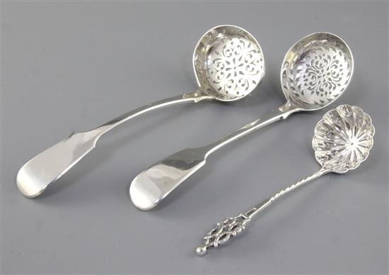 An early Victorian silver fiddle pattern sifter spoon, by John Harris IV & 2 others, 111 grams.